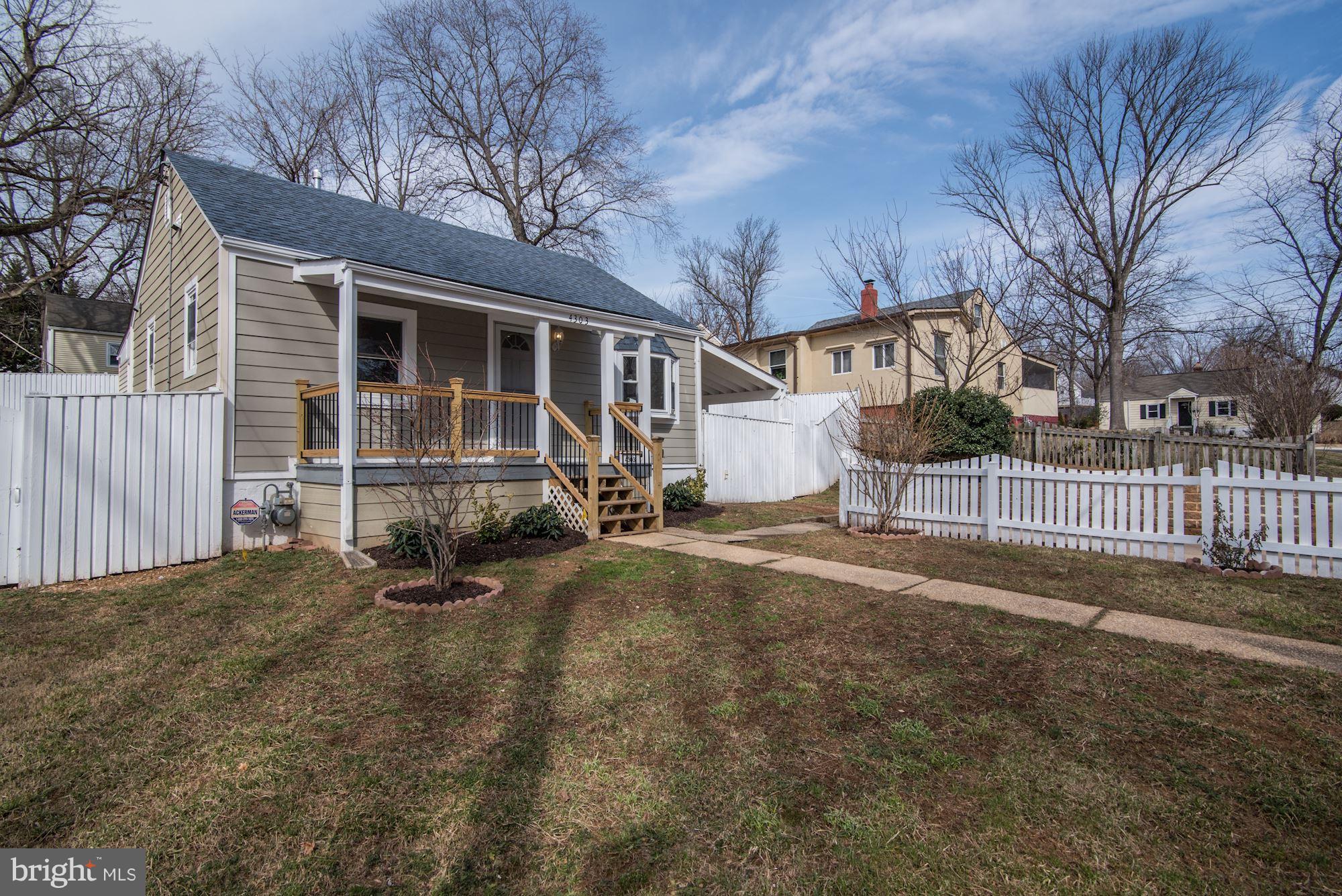 4303 Ivy Glen Road Silver Spring, MD 20906 - Photo 1 of 30 a view of a house with a wooden fence