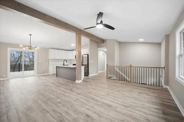 a view of a kitchen with a sink and a window