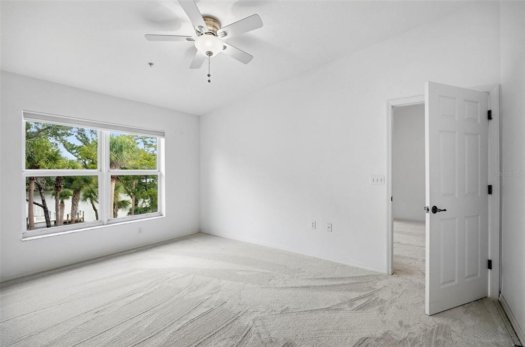 100 Canopy Walk Lane, Unit 133 Palm Coast, FL 32137 - Photo 13 of 51 a view of an empty room with a window