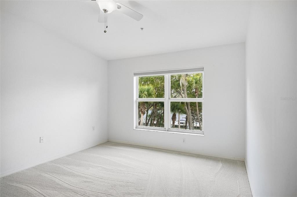 100 Canopy Walk Lane, Unit 133 Palm Coast, FL 32137 - Photo 14 of 51 an empty room with a window