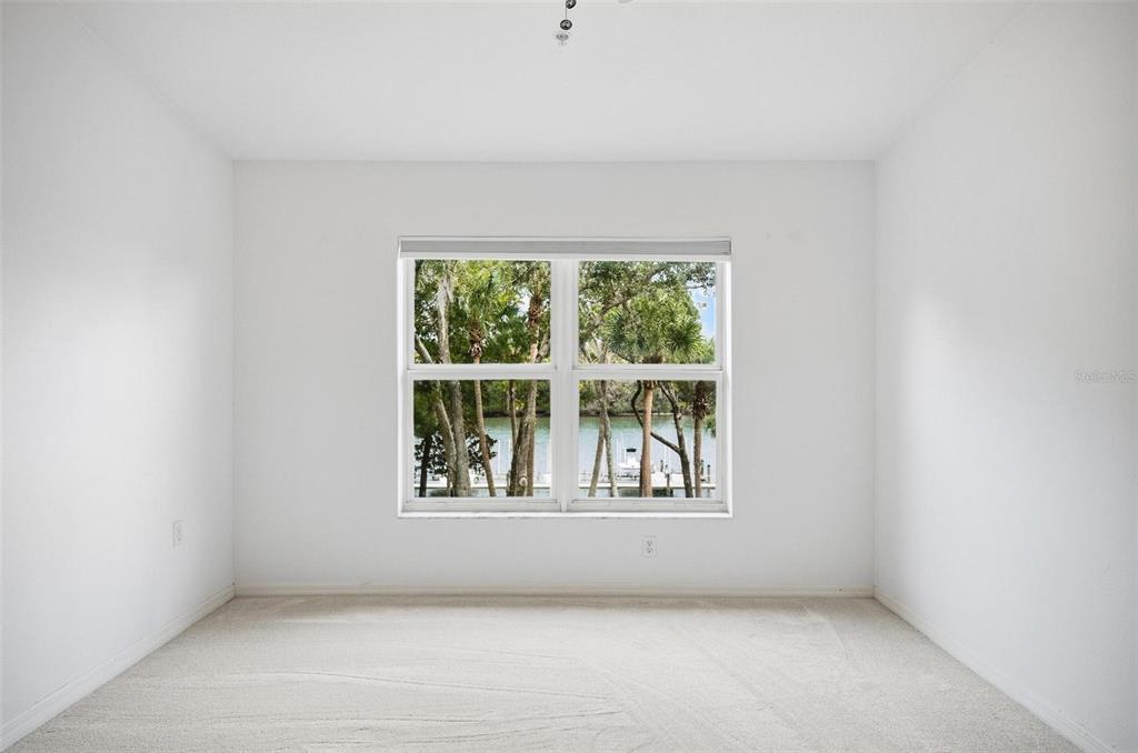 100 Canopy Walk Lane, Unit 133 Palm Coast, FL 32137 - Photo 17 of 51 an empty room with a window