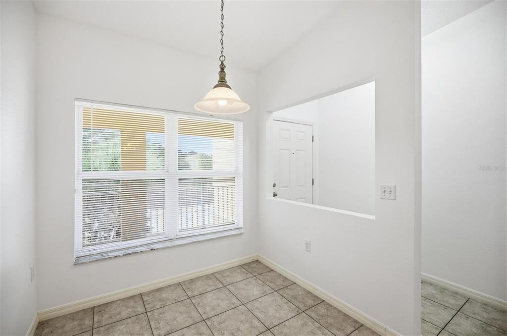 100 Canopy Walk Lane, Unit 133 Palm Coast, FL 32137 - Photo 24 of 51 a view of an empty room with window