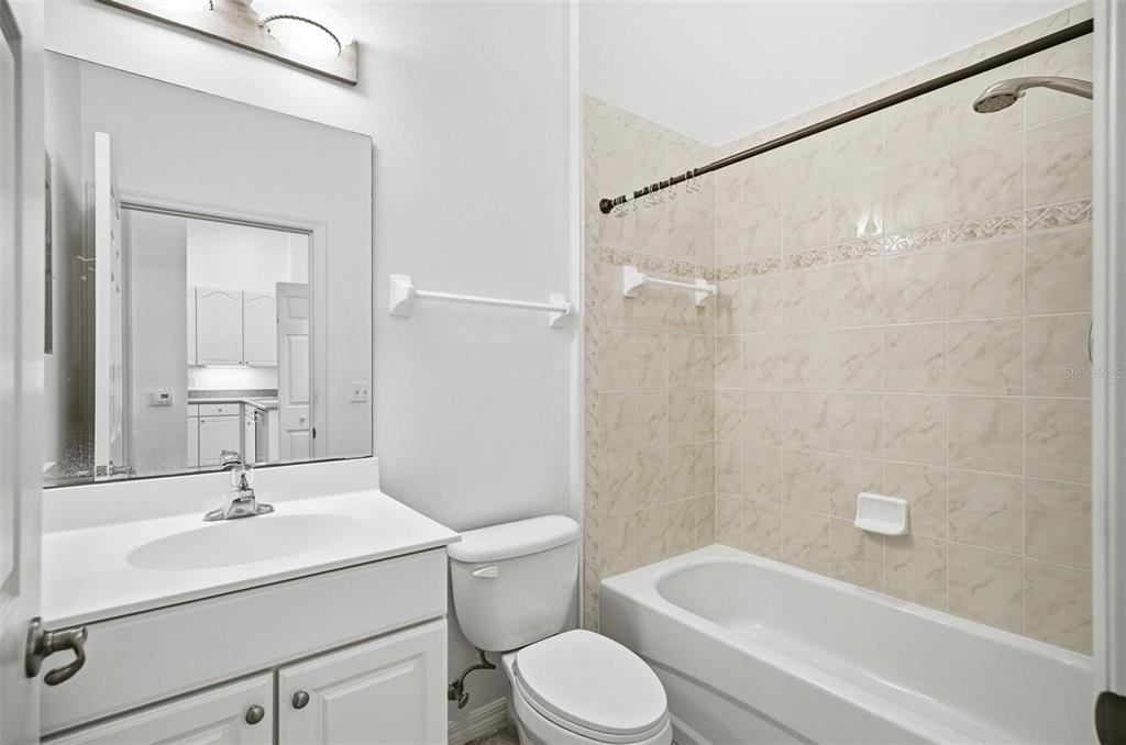 100 Canopy Walk Lane, Unit 133 Palm Coast, FL 32137 - Photo 28 of 51 a bathroom with a sink toilet and shower