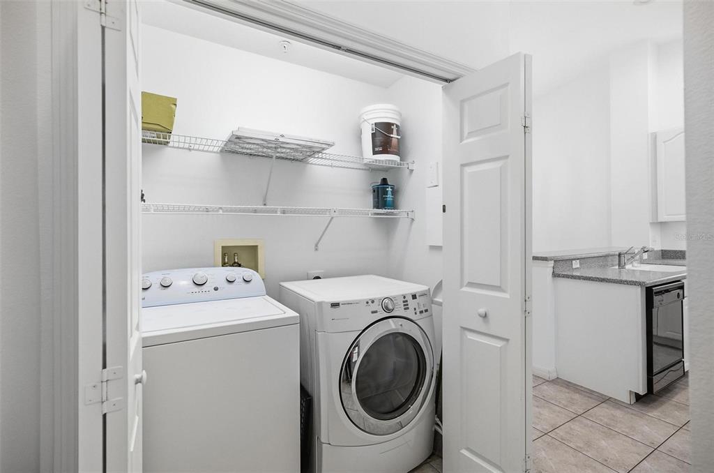 100 Canopy Walk Lane, Unit 133 Palm Coast, FL 32137 - Photo 30 of 51 a utility room with dryer and washer