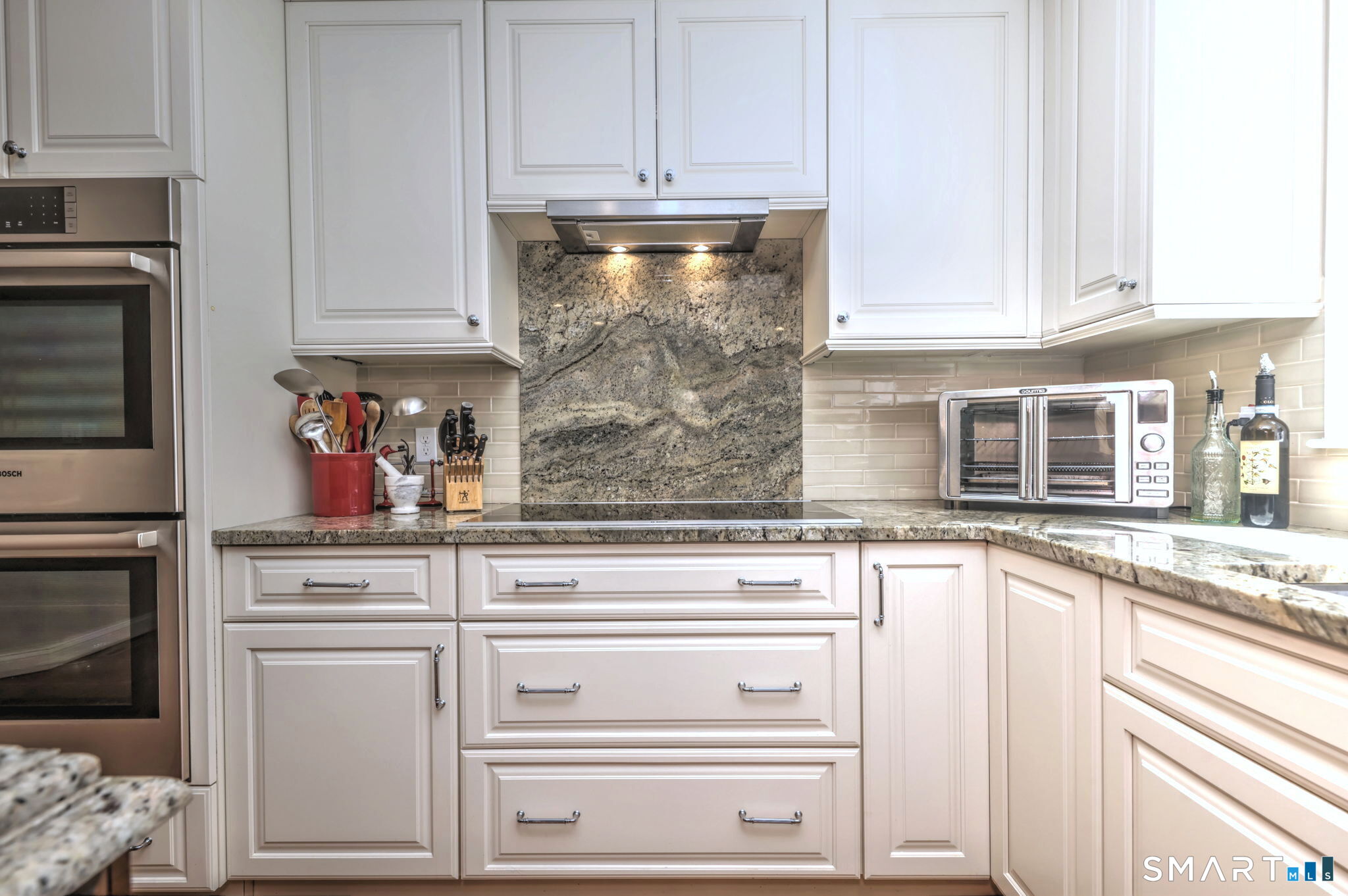 60 West Meadow Road Hamden, CT 06518 - Photo 7 of 35 Induction cooktop with vent