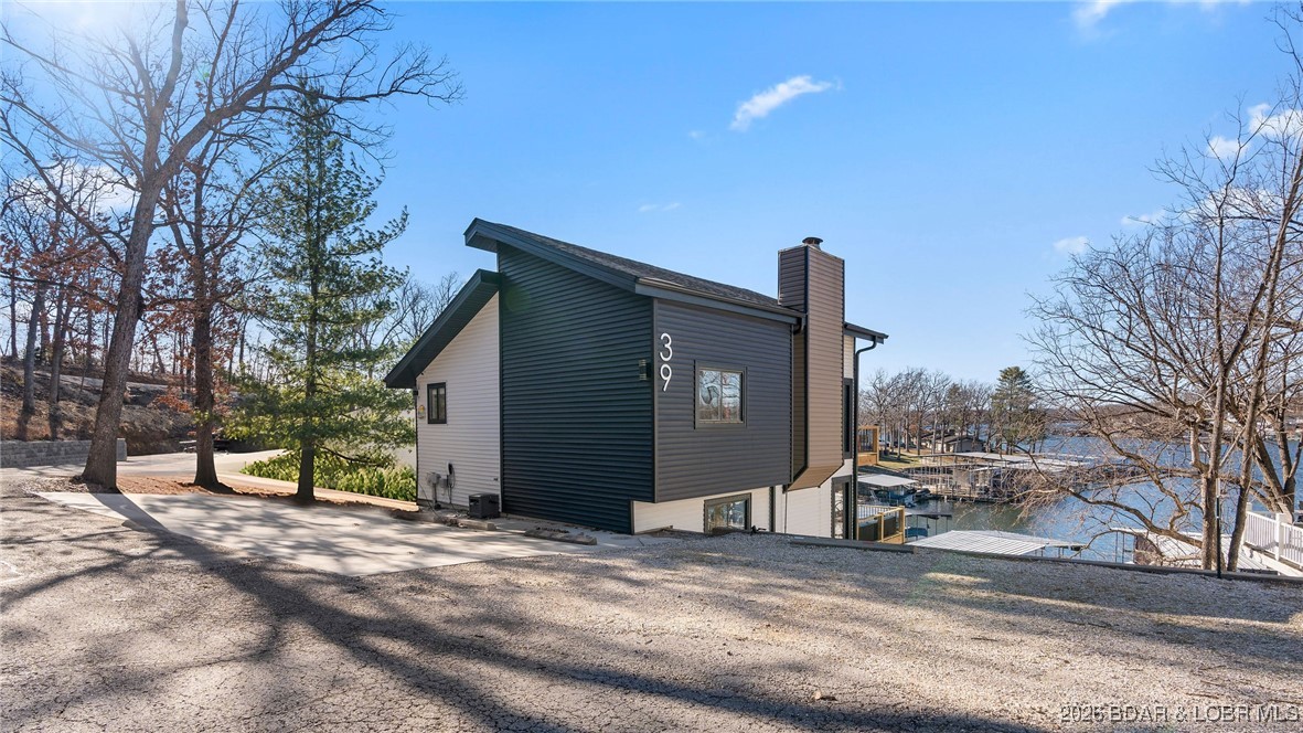 39 Bayview Cove Road Lake Ozark, MO 65049 - Photo 23 of 75 38 Bayview Cove Rd. Lake Ozark, MO. View of house