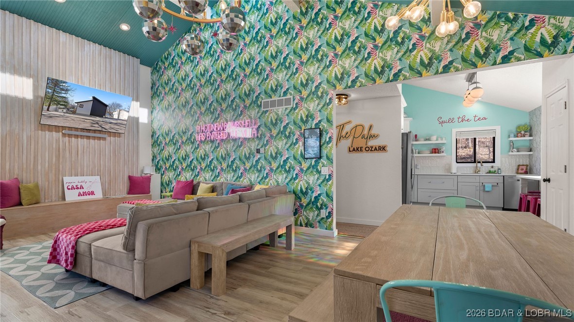 39 Bayview Cove Road Lake Ozark, MO 65049 - Photo 6 of 75 38 Bayview Cove Rd. Lake Ozark, MO. Upstairs livin