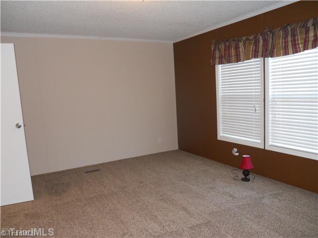 7130 Mendenhall Road Archdale, NC 27263 - Photo 3 of 11 Master Bedroom.