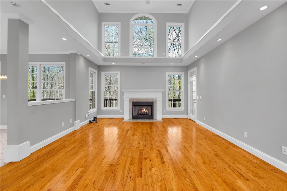 204 Red Maple Way Clemson, SC 29631 - Photo 6 of 48 This airy living space features lustrous hardwood floors and abundant natural light.