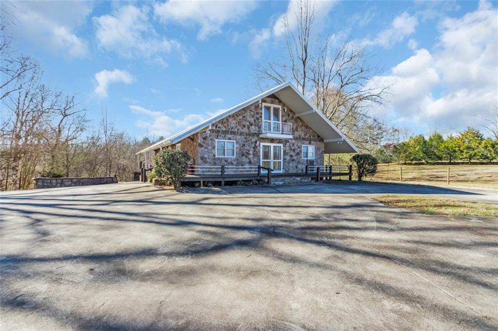 680 Wrights Mill Road Commerce, GA 30530 - Photo 1 of 1 a view of city in the middle of a house
