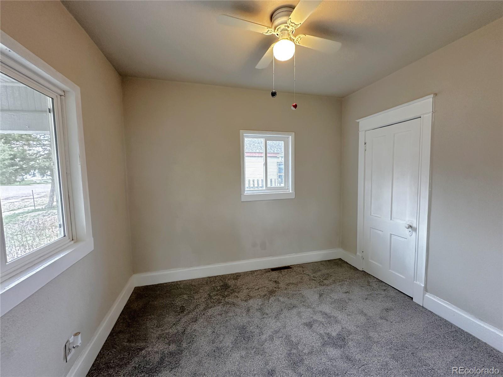 672 4th Street Limon, CO 80828 - Photo 9 of 28 an empty room with a window