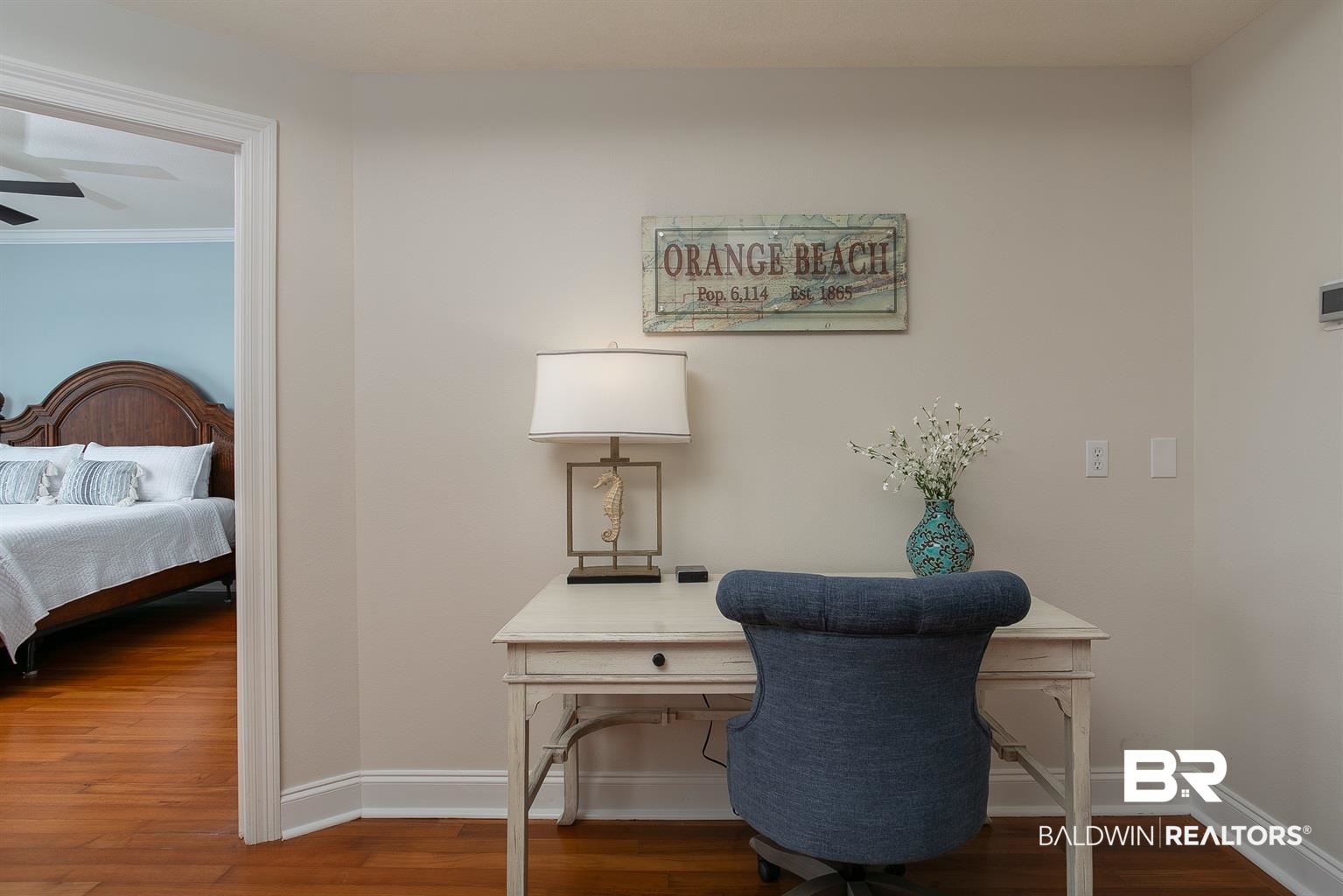 27800 Canal Road, Unit 411 Orange Beach, AL 36561 - Photo 30 of 49 Dedicated desk area with wood-finish flooring and a light-toned wall finish