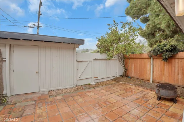 a view of a backyard of the house