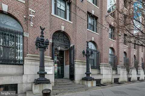 a front view of a building with street view