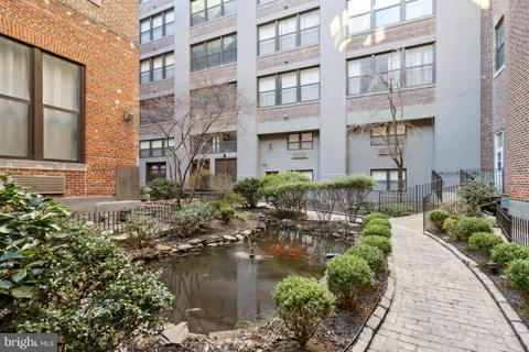 a building with river in front of it