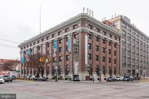 a view of a building with a street