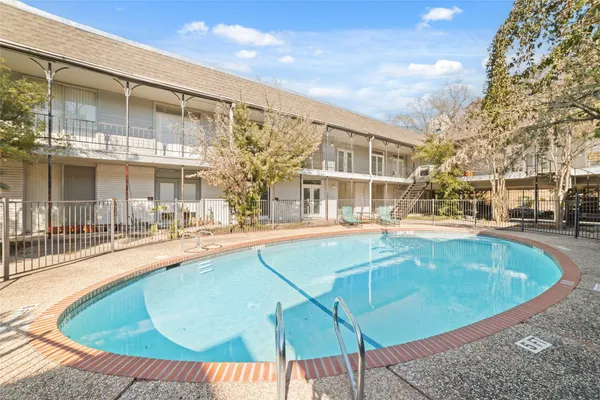 a view of outdoor space swimming pool and outdoor seating