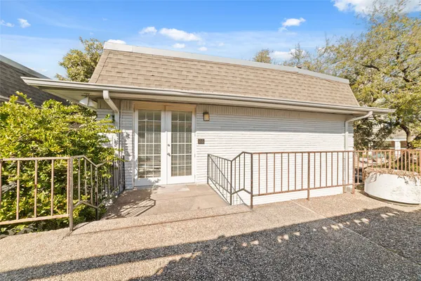 a front view of a house with a porch