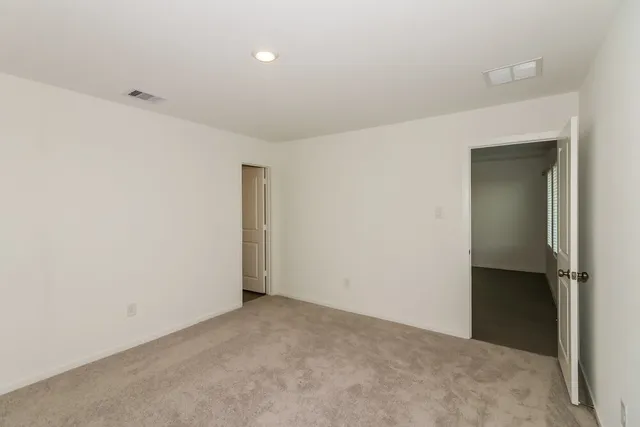 an empty room with an entryway