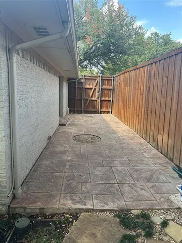 a view of backyard with green space