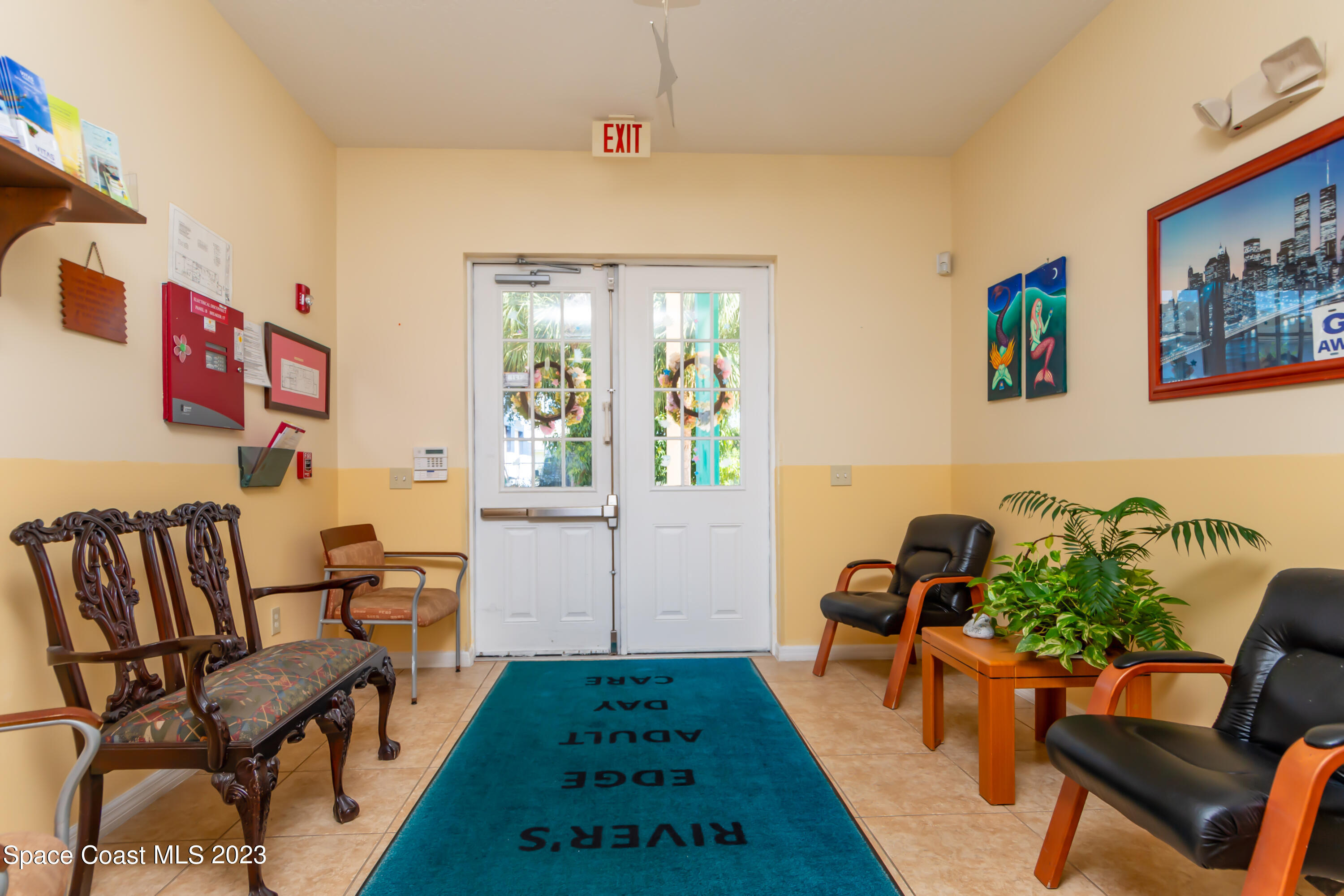 422 Martin Road Palm Bay, FL 32909 - Photo 12 of 37 a living room with furniture and a rug
