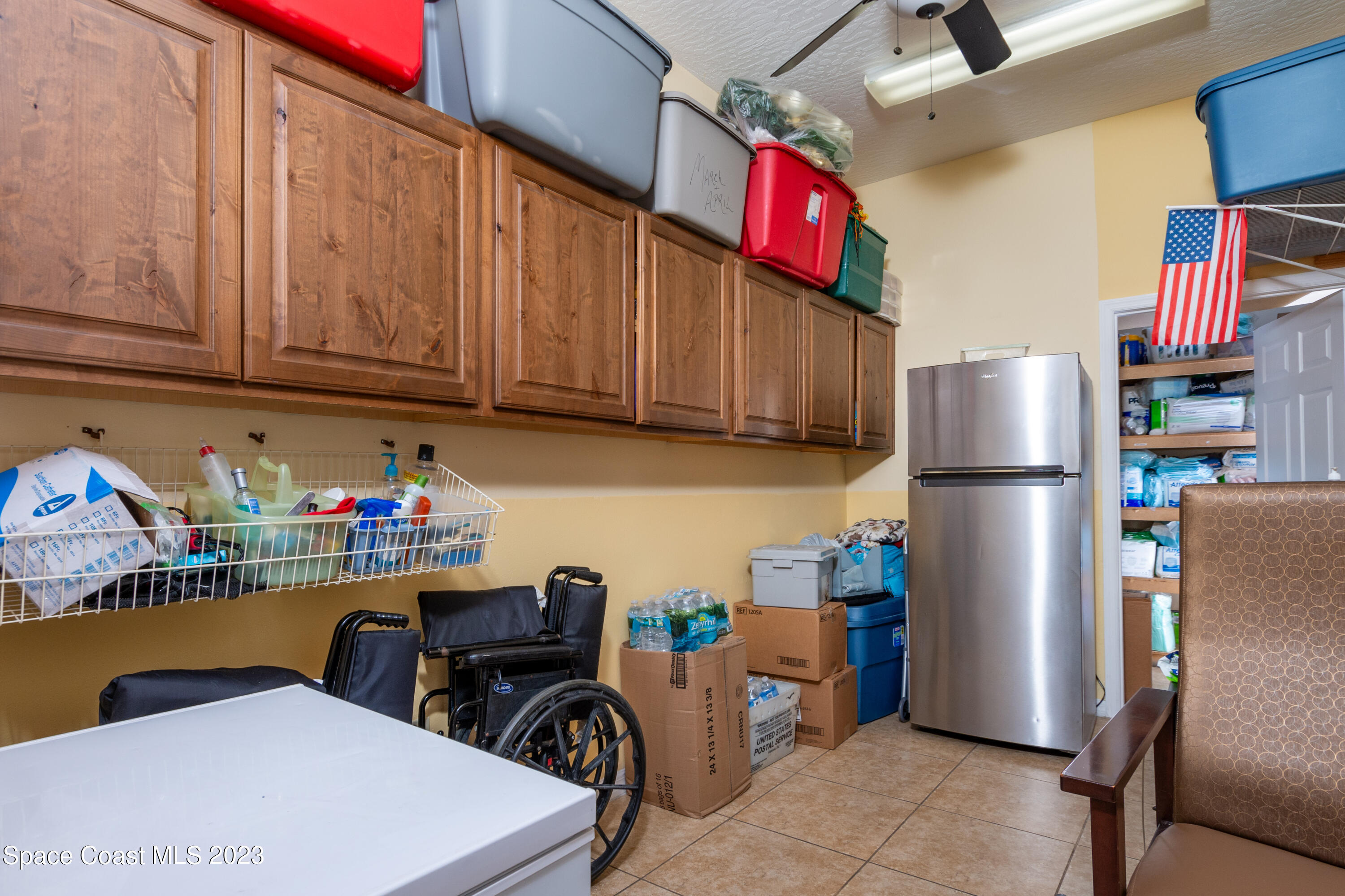 422 Martin Road Palm Bay, FL 32909 - Photo 21 of 37 a kitchen with stainless steel appliances granite countertop a refrigerator and a stove top oven