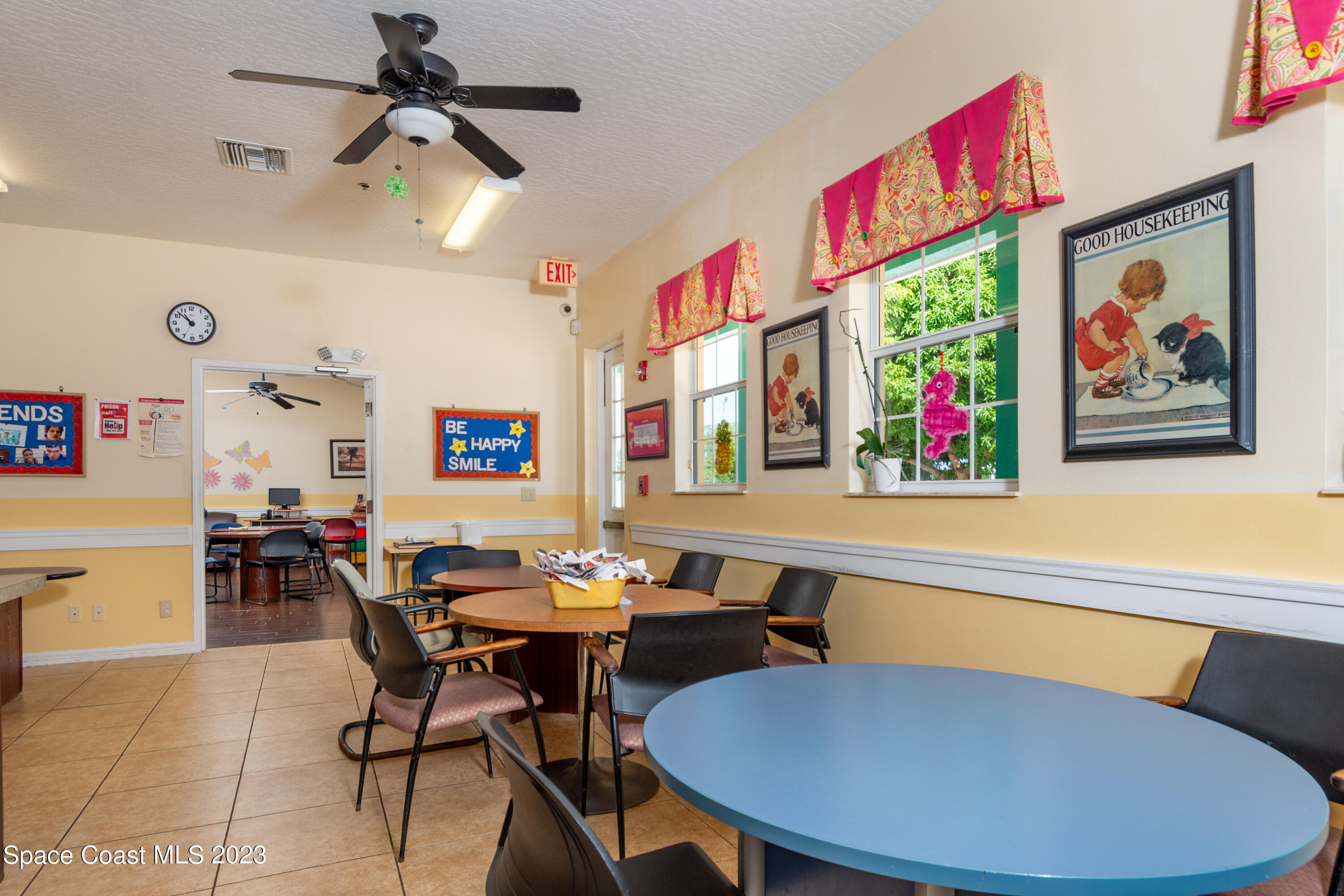 422 Martin Road Palm Bay, FL 32909 - Photo 26 of 37 a view of a dining room with furniture a rug and wooden floor