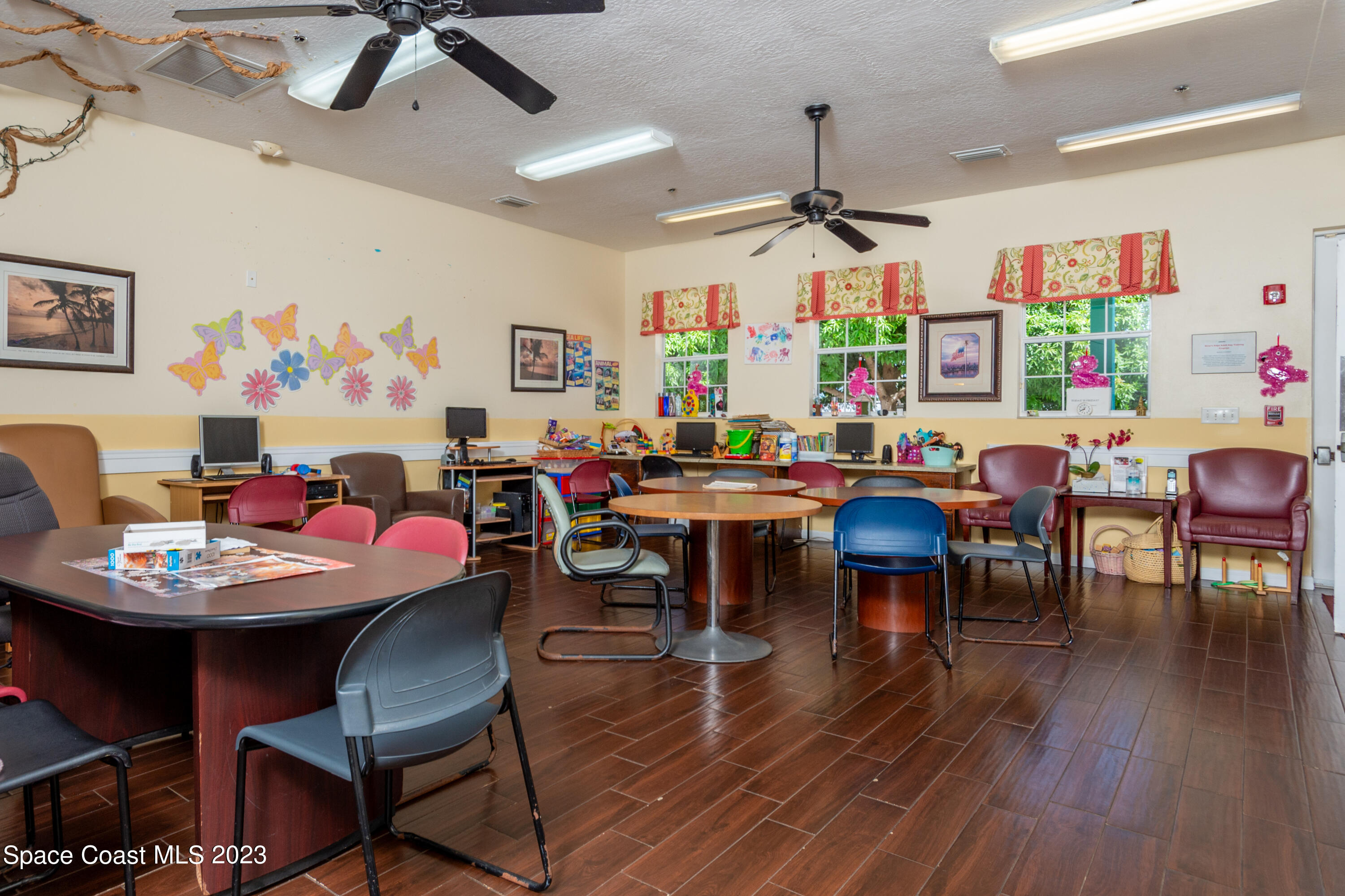 422 Martin Road Palm Bay, FL 32909 - Photo 31 of 37 a view of a dining room with furniture and wooden floor