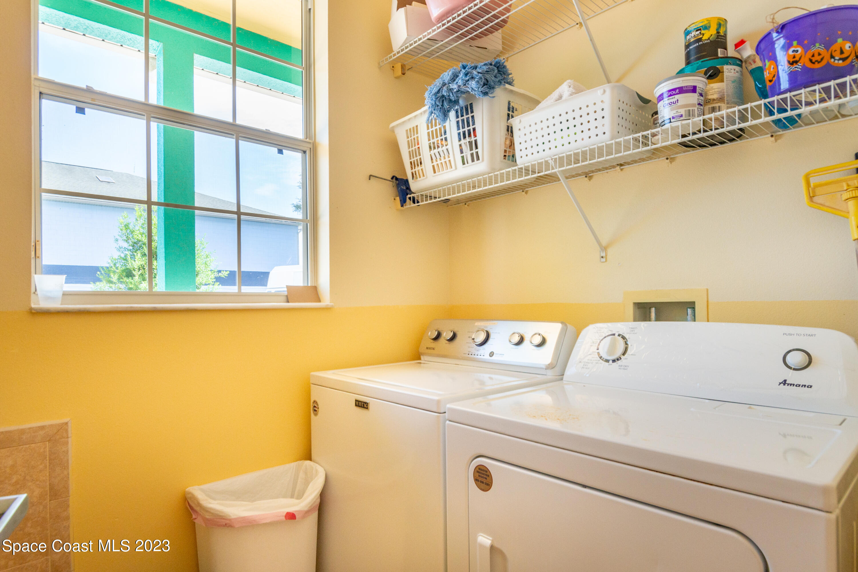 422 Martin Road Palm Bay, FL 32909 - Photo 34 of 37 a utility room with dryer and washer