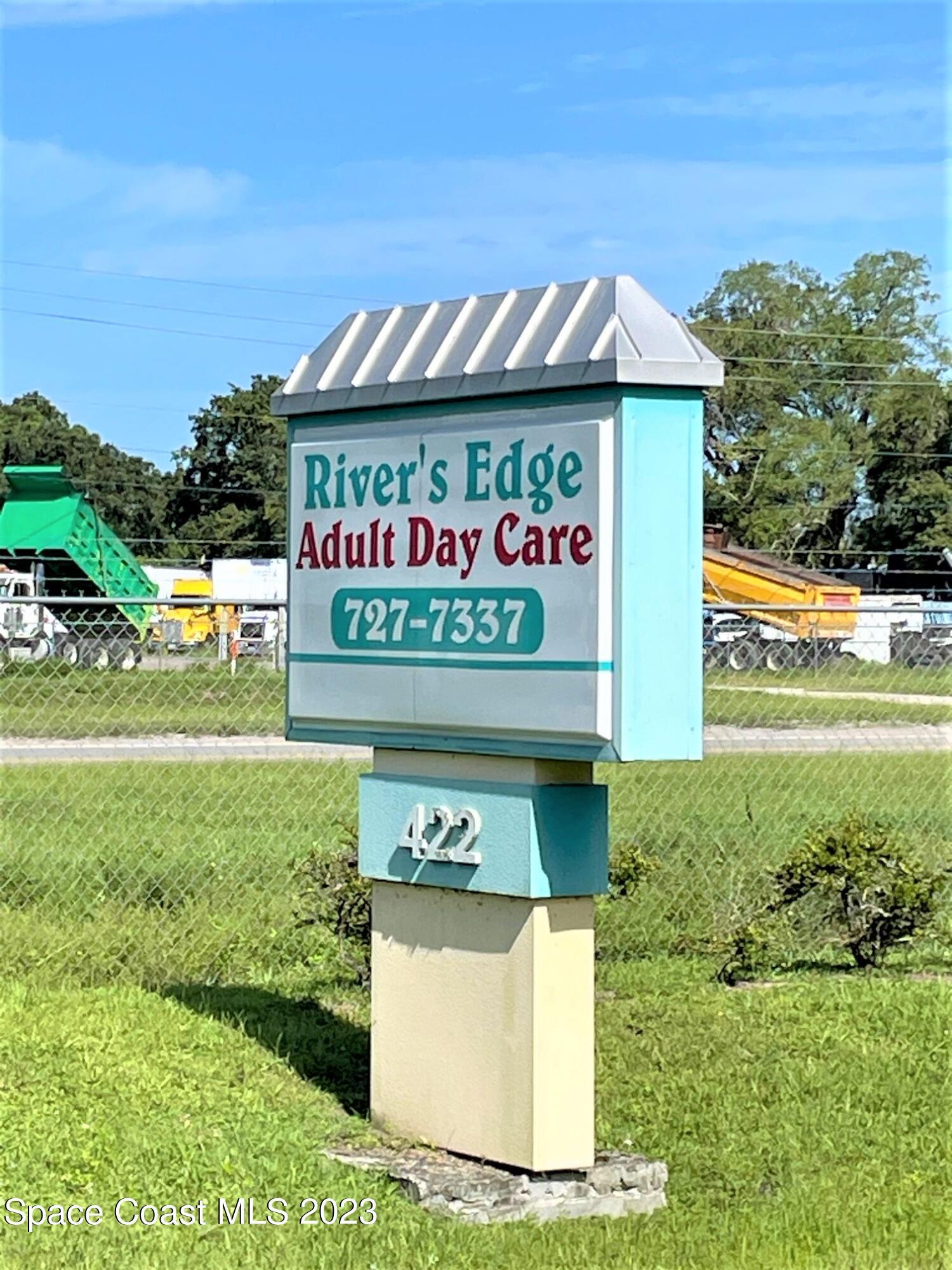 422 Martin Road Palm Bay, FL 32909 - Photo 37 of 37 a sign on the side of the road