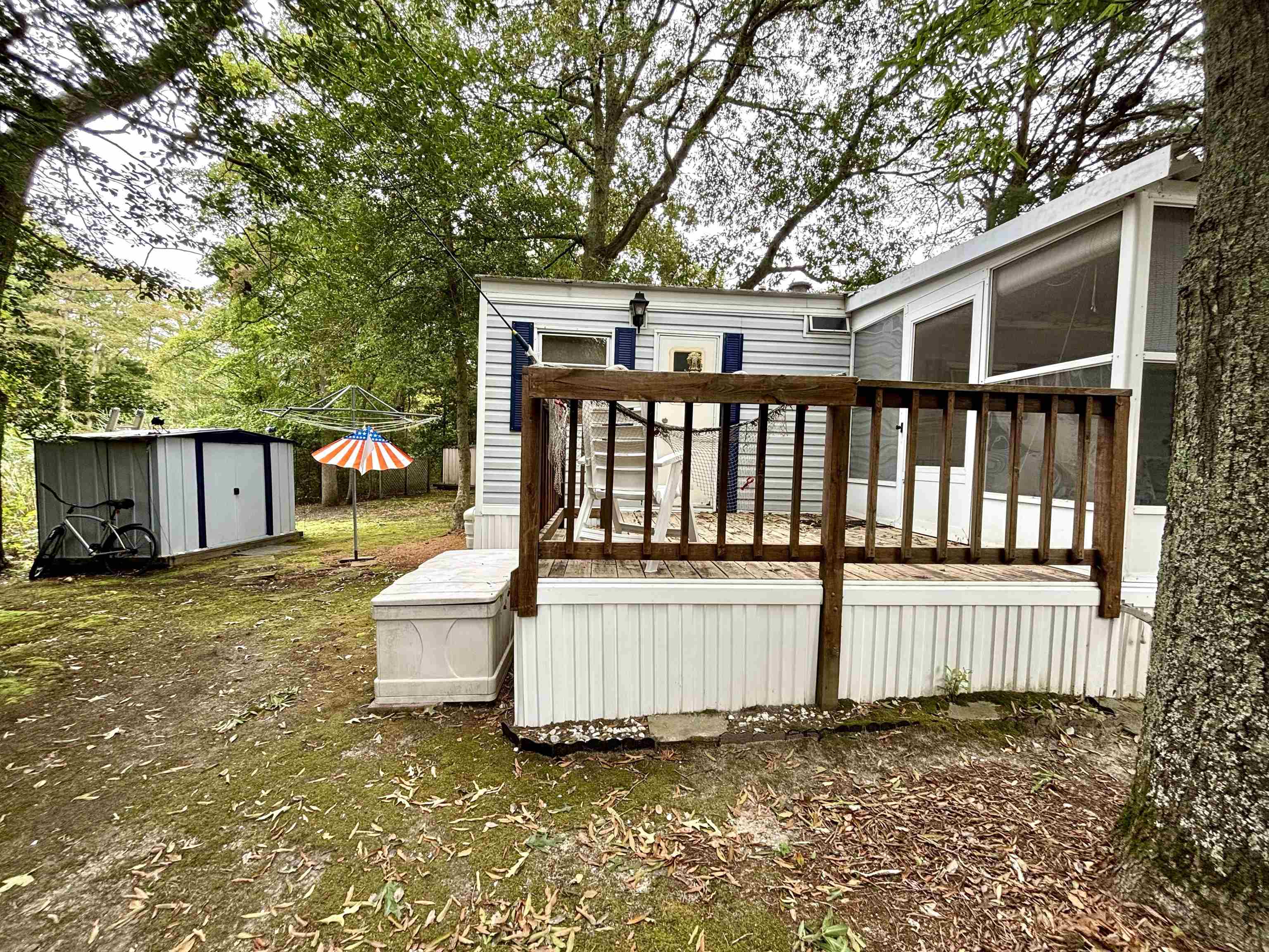 709 Highway 9 Cape May, NJ 08204 - Photo 9 of 16 a backyard of a house with wooden floor
