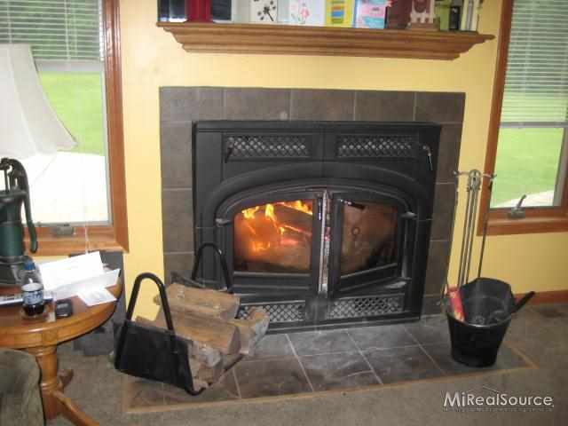 1705 Stoddard Road Columbus, MI 48063 - Photo 16 of 26 energy efficient wood burner w/ blower