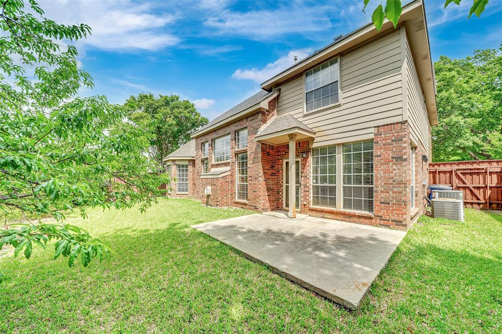 1333 Lighthouse Lane Allen, TX 75013 - Photo 38 of 40 a front view of a house with a yard and porch