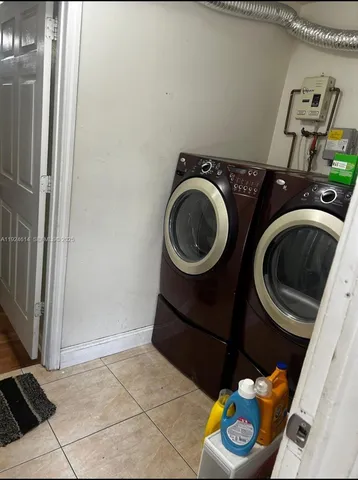 a view of a backyard of the house