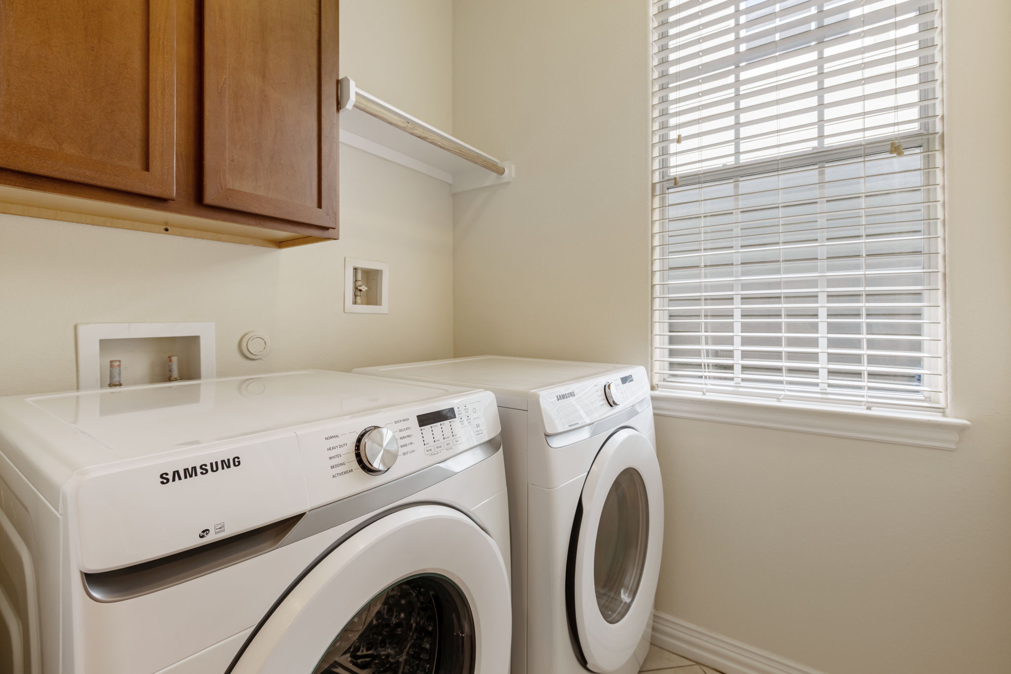 6715 Windrift Way, Unit 20 Austin, TX 78745 - Photo 18 of 38 First-floor Laundry Room (washer and dryer convey)