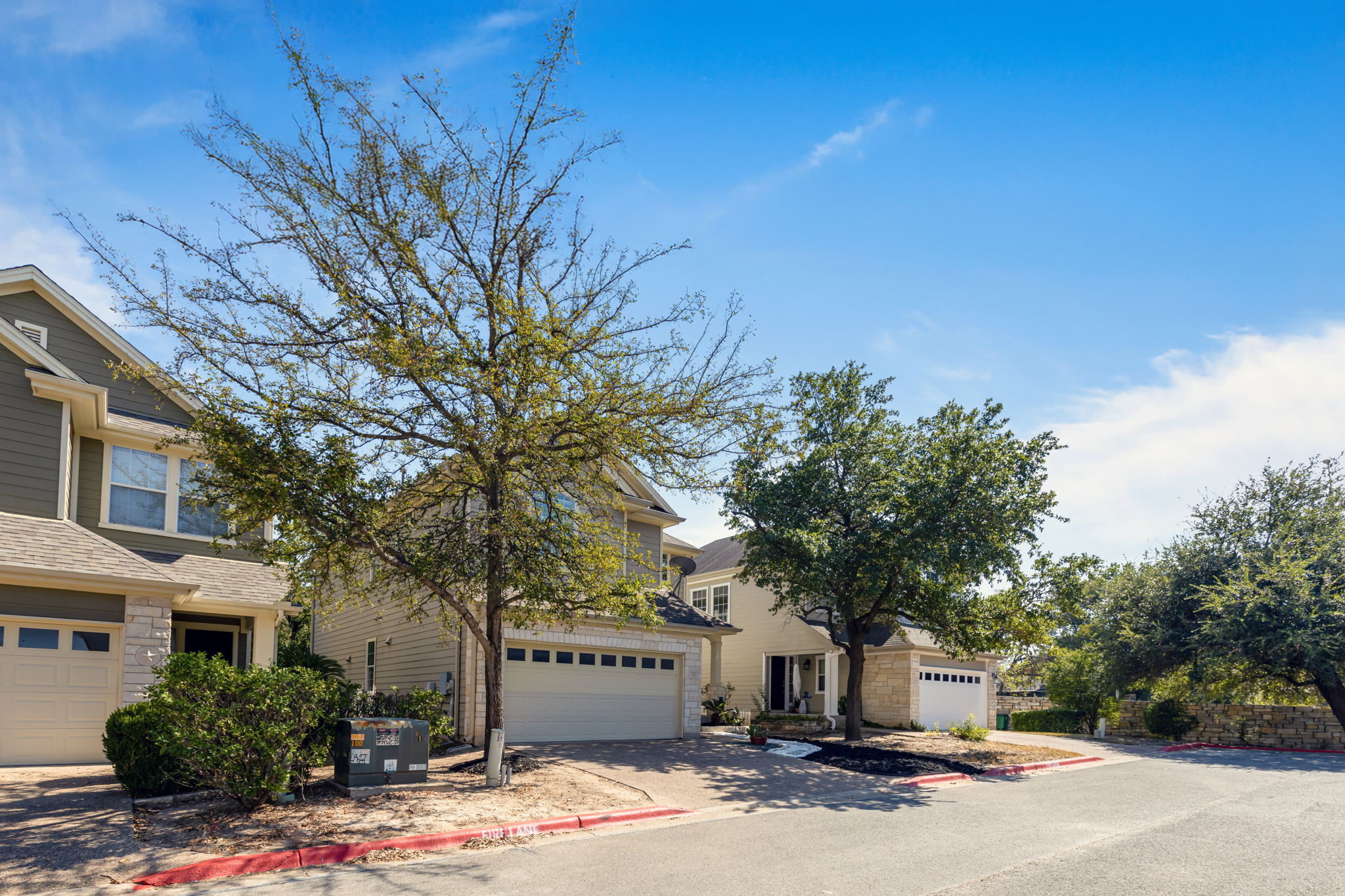 6715 Windrift Way, Unit 20 Austin, TX 78745 - Photo 3 of 38 2-car Garage