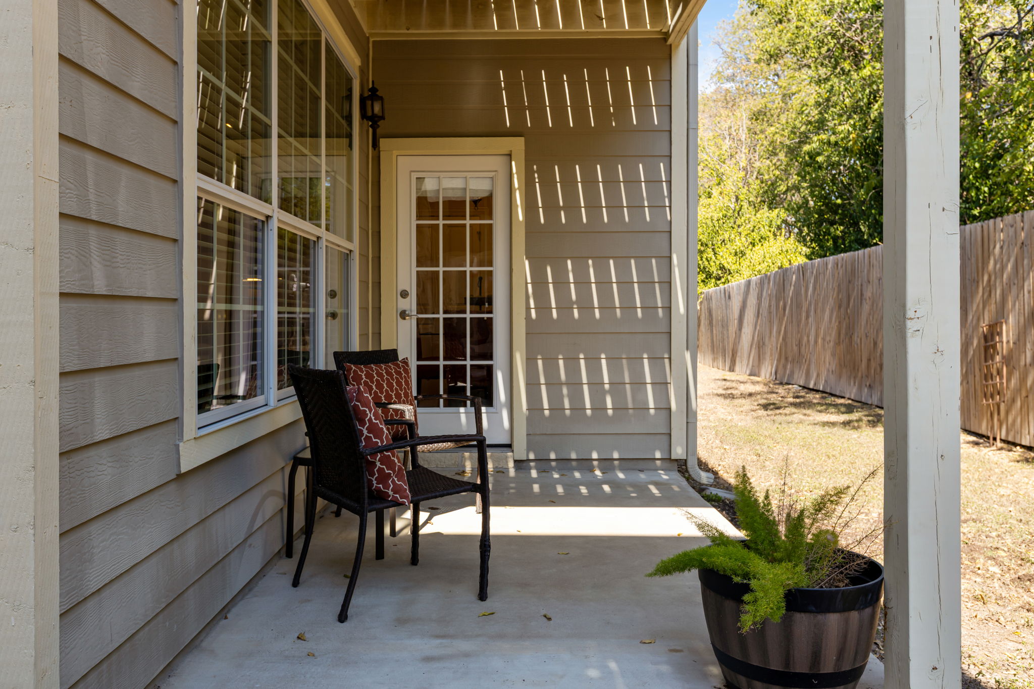 6715 Windrift Way, Unit 20 Austin, TX 78745 - Photo 36 of 38 Outdoor Porch off Kitchen