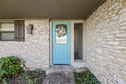a front view of a house with a door