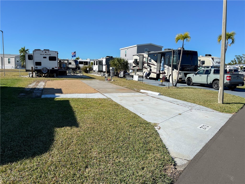 19681 Summerlin Road, Unit 273 Fort Myers, FL 33908 - Photo 2 of 16 a view of outdoor space with seating area