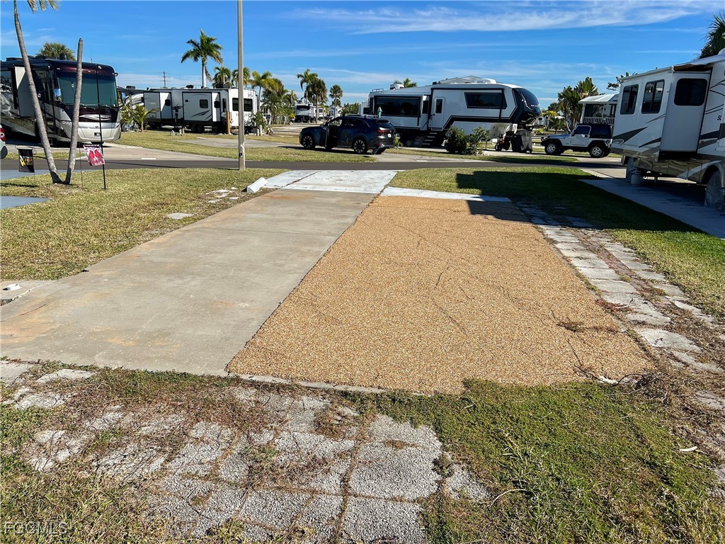 19681 Summerlin Road, Unit 273 Fort Myers, FL 33908 - Photo 4 of 16 a view of a swimming pool with a patio