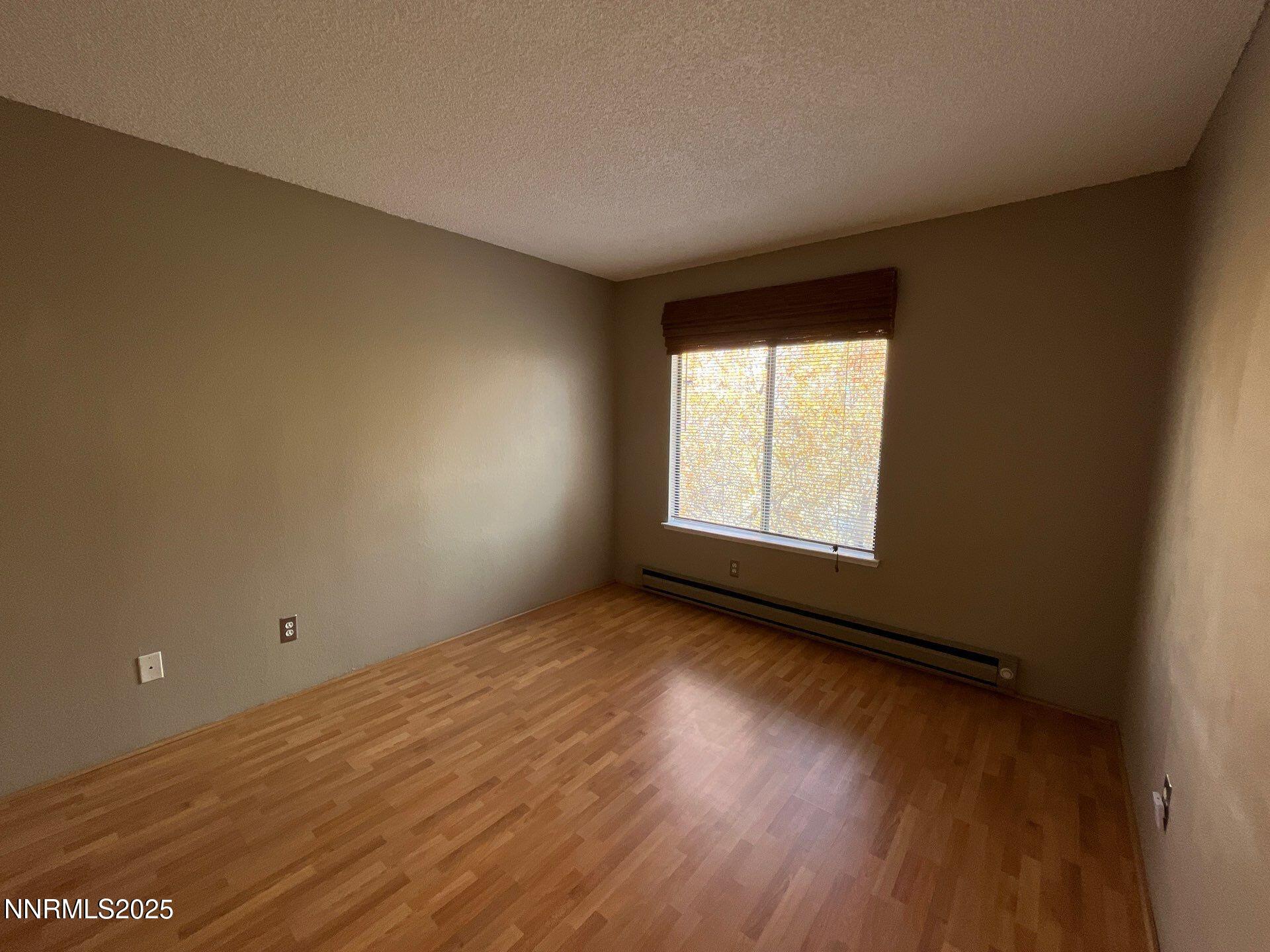 3885 East Leonesio Drive, Unit A2 Reno, NV 89512 - Photo 7 of 11 Leonesio primary bedroom