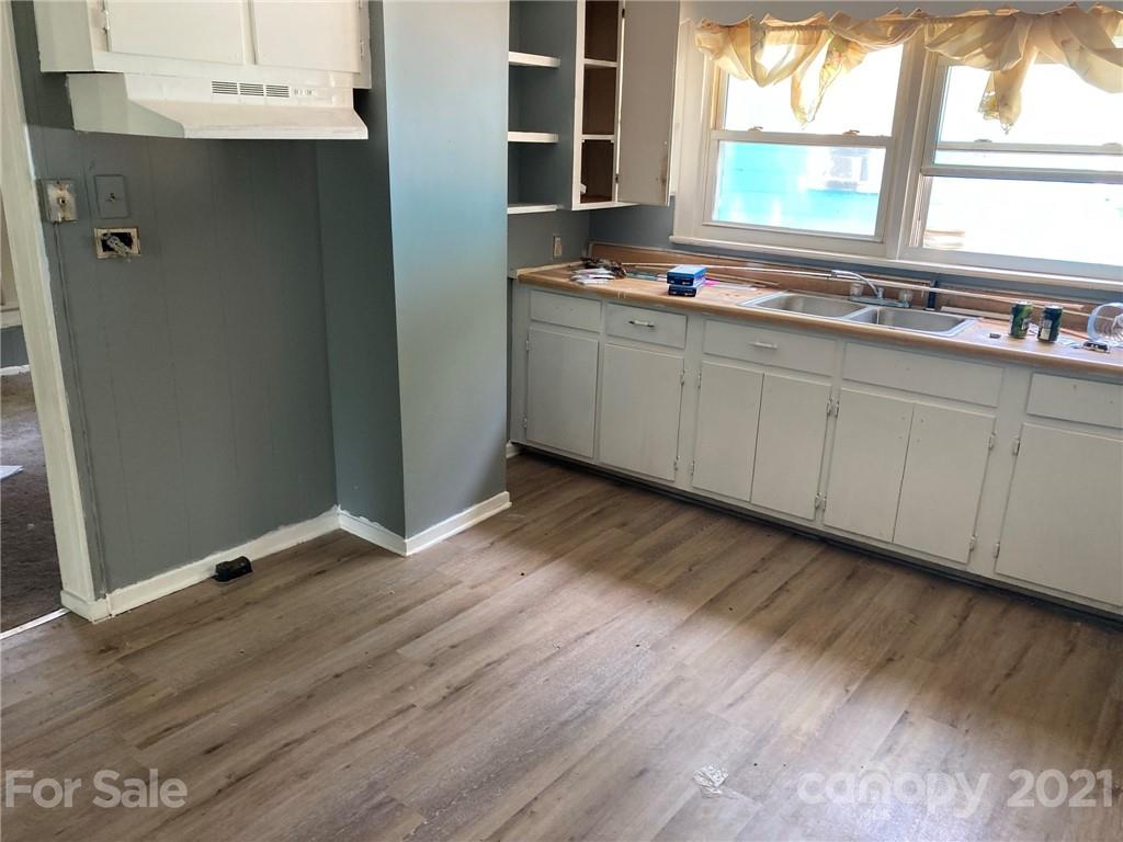 1005 Rickert Street Statesville, NC 28677 - Photo 3 of 10 a room with wooden floor and window