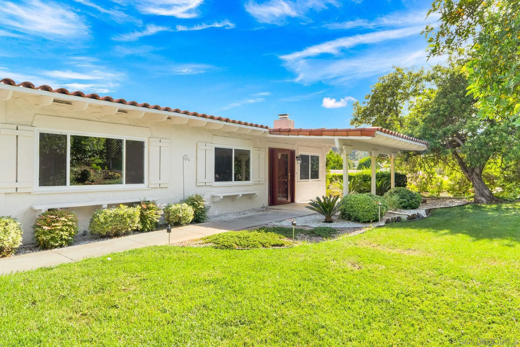 12424 Rios Road San Diego, CA 92128 - Photo 3 of 35 a view of a house with a patio