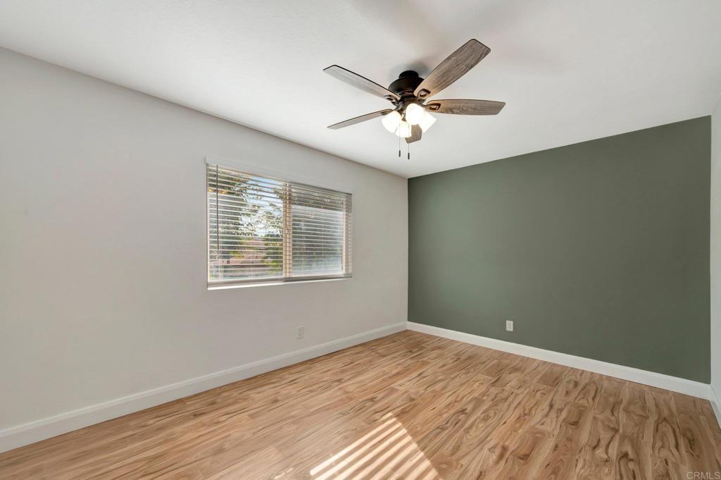9932 Mission Vega Road, Unit 2 Santee, CA 92071 - Photo 14 of 28 a view of a big room with wooden floor and windows