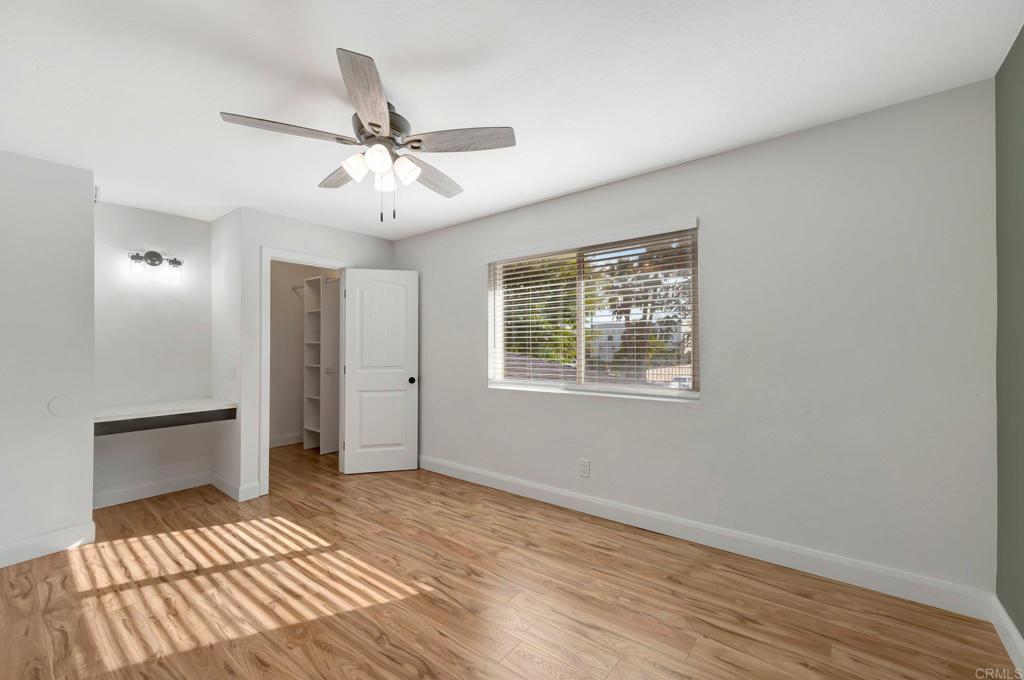 9932 Mission Vega Road, Unit 2 Santee, CA 92071 - Photo 18 of 28 a view of an empty room with window and wooden floor