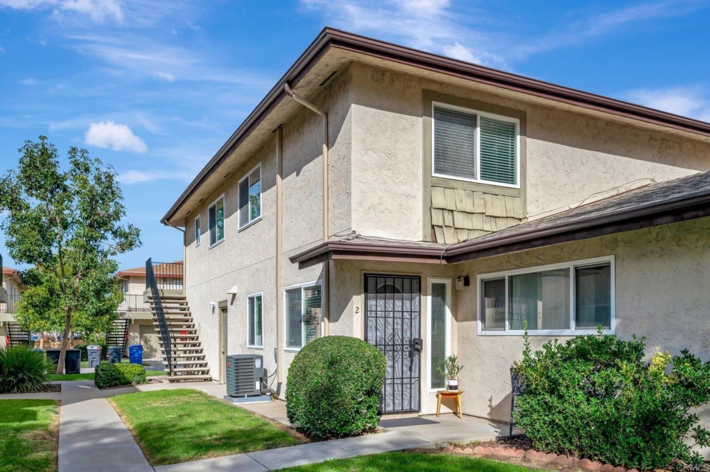 9932 Mission Vega Road, Unit 2 Santee, CA 92071 - Photo 24 of 28 a view of a house with a yard