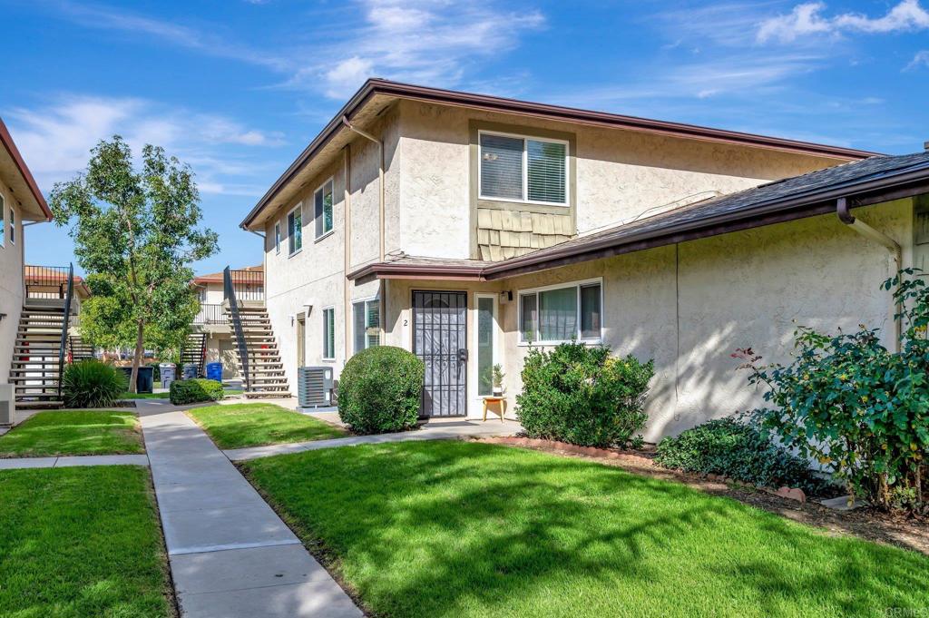 9932 Mission Vega Road, Unit 2 Santee, CA 92071 - Photo 27 of 28 a front view of a house with garden