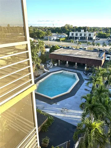 a view of outdoor space and swimming pool