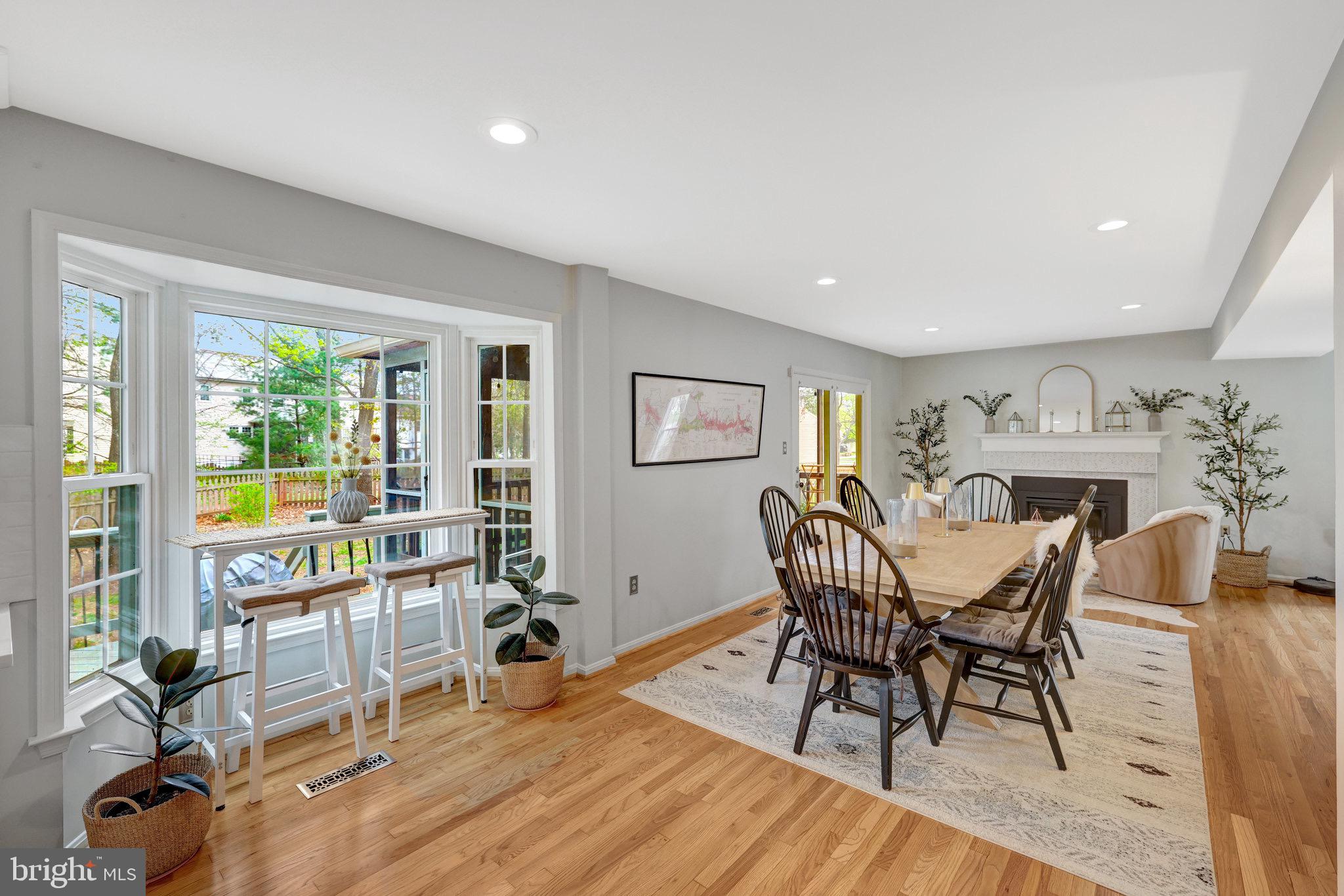 44116 Bristow Circle Ashburn, VA 20147 - Photo 20 of 79 a view of a dining room with furniture window and outside view