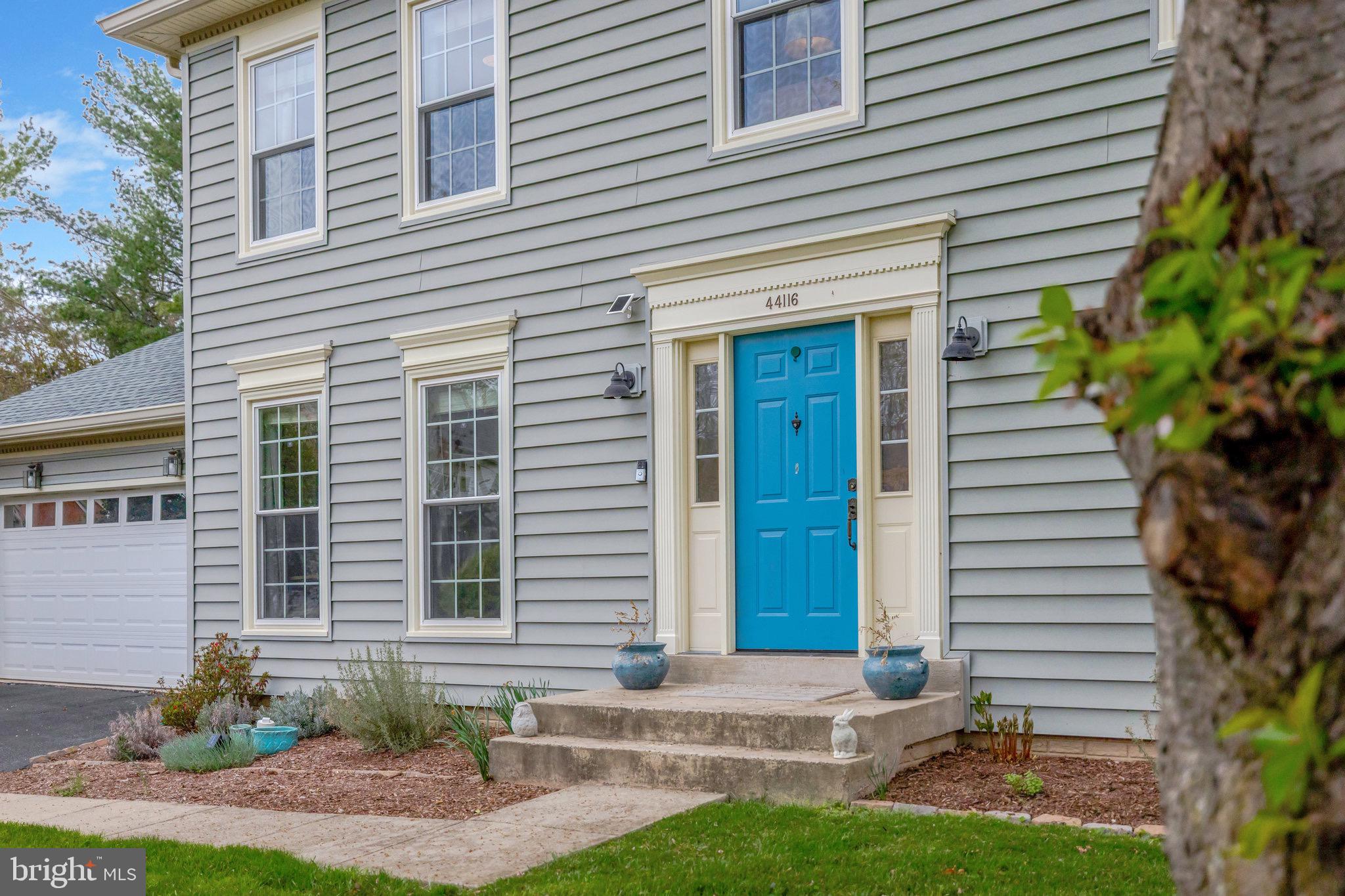 44116 Bristow Circle Ashburn, VA 20147 - Photo 4 of 79 a front view of a house with garden